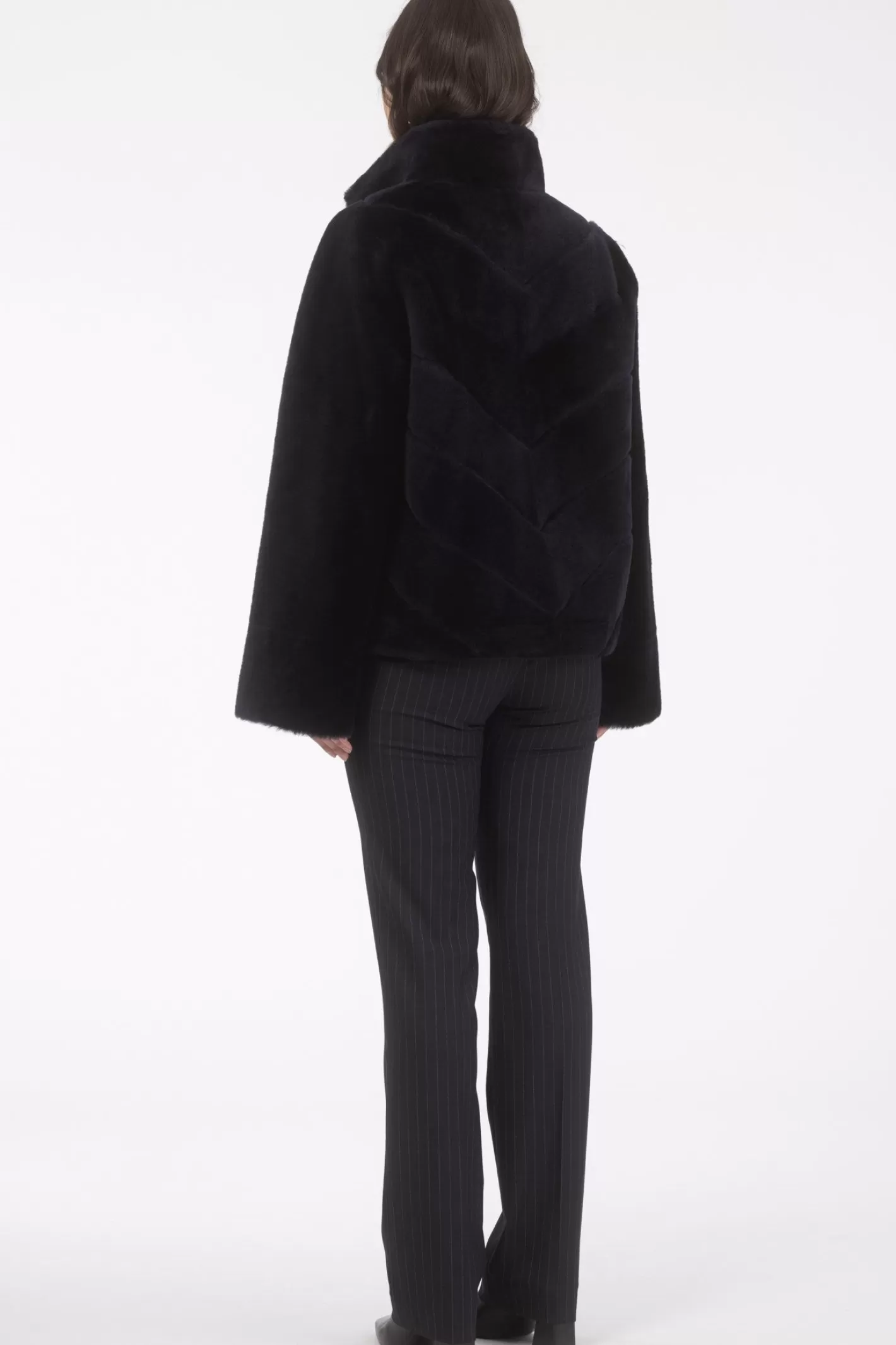 Veste réversible GORSKI Montréal pour femme – Doudoune en laine mérinos et agneau shearling avec motif chevron et ourlet droit