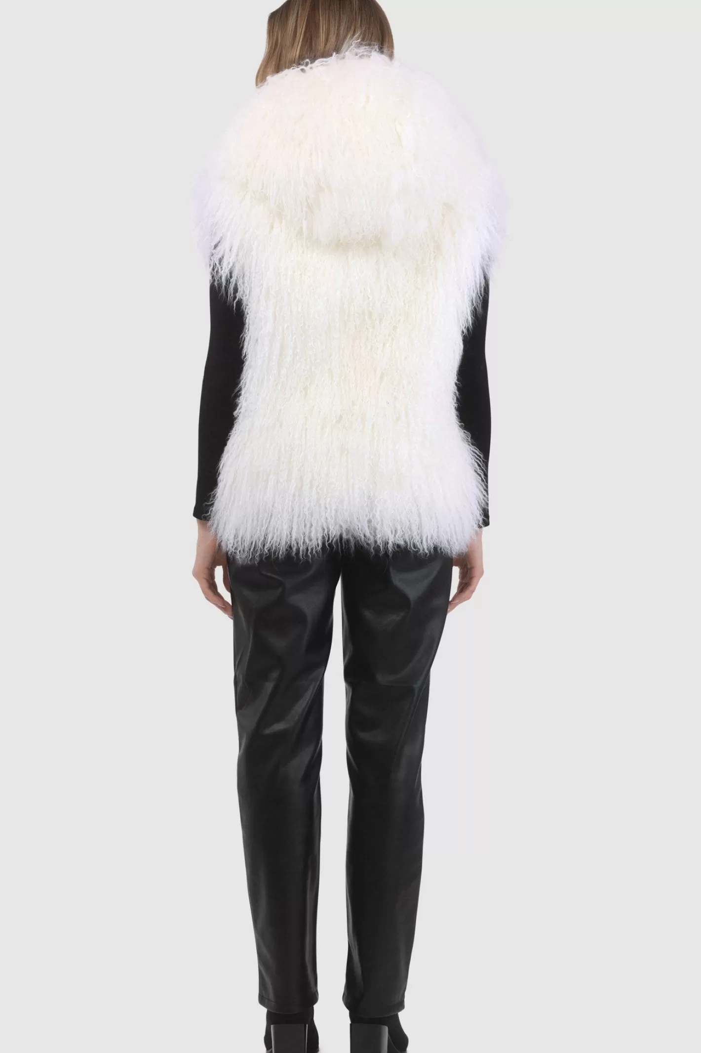 Veste réversible femme GORSKI Montréal - Édition exclusive en agneau shearling mongol avec doublure en laine et cachemire Loro Piana - Confort hiver et élégance intemporelle 

(Note : J'ai restructuré la phrase pour une lecture plus fluide, ajouté des termes évocateurs comme 