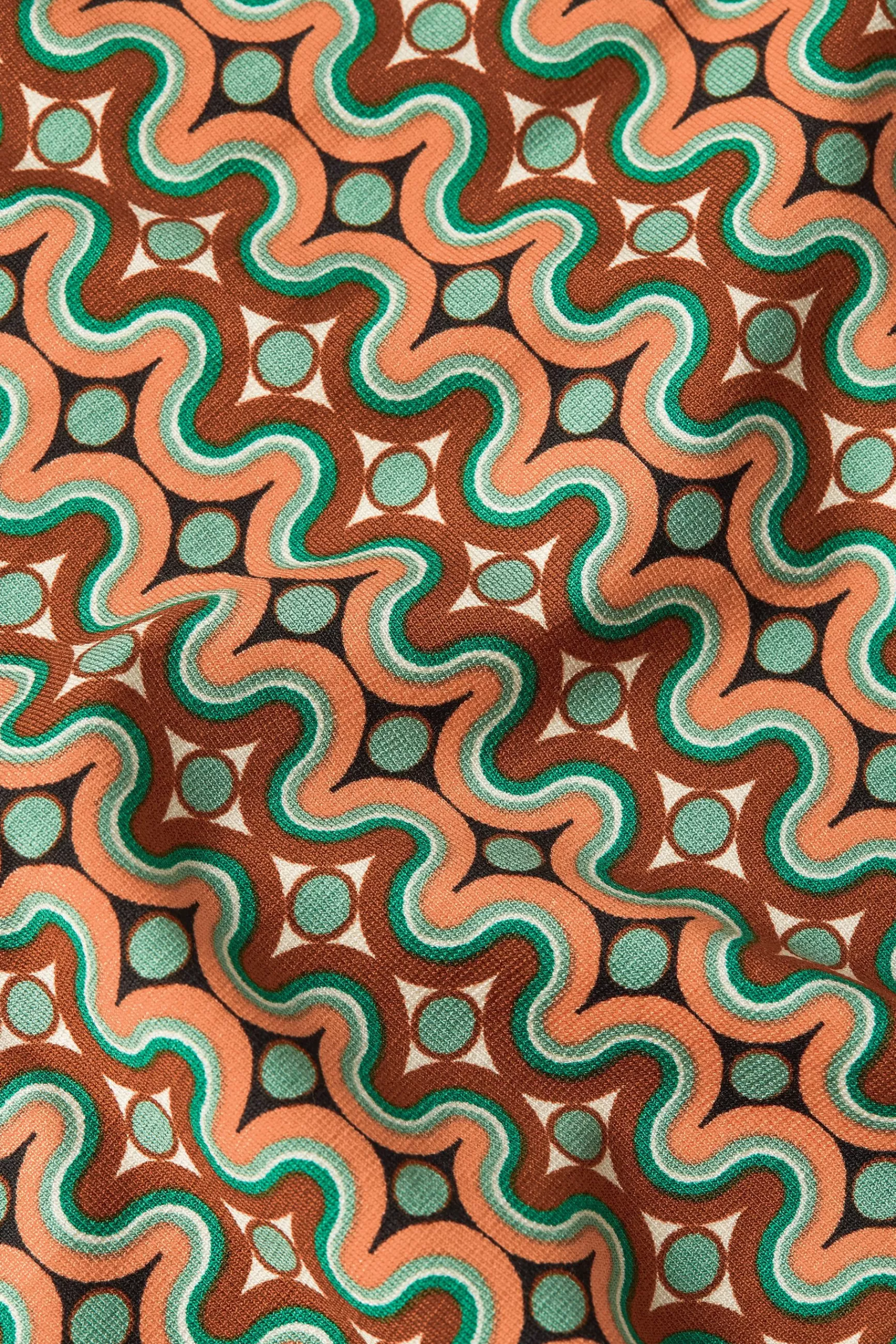 Robe élégante Sheeva King Louie avec motifs entrelacés - Création intemporelle de la marque DAMES